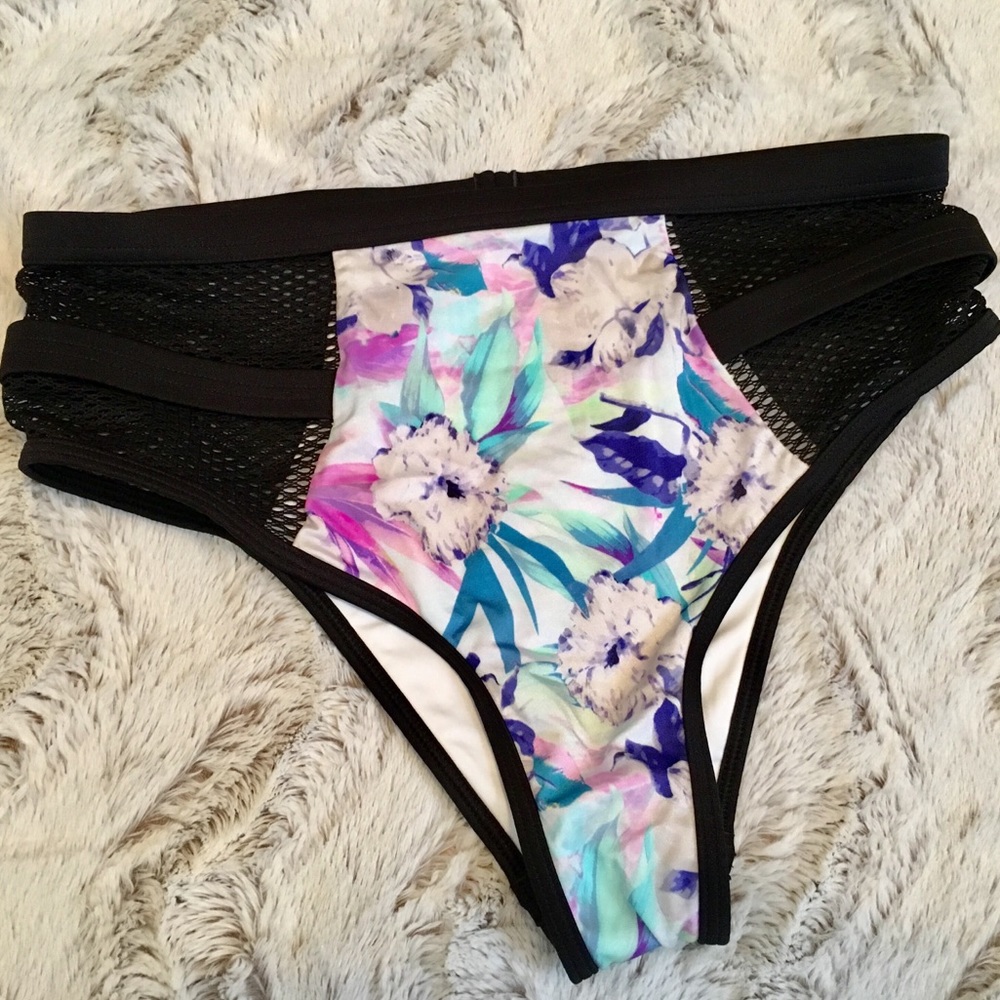 Victoria Secret High waisted bathing suit bottoms.